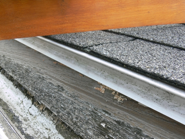 old growth Wood gutter inspection and repair in Newport, RI - east ...